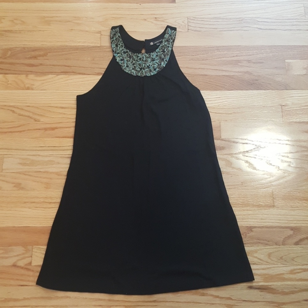 Black shift dress with emerald details